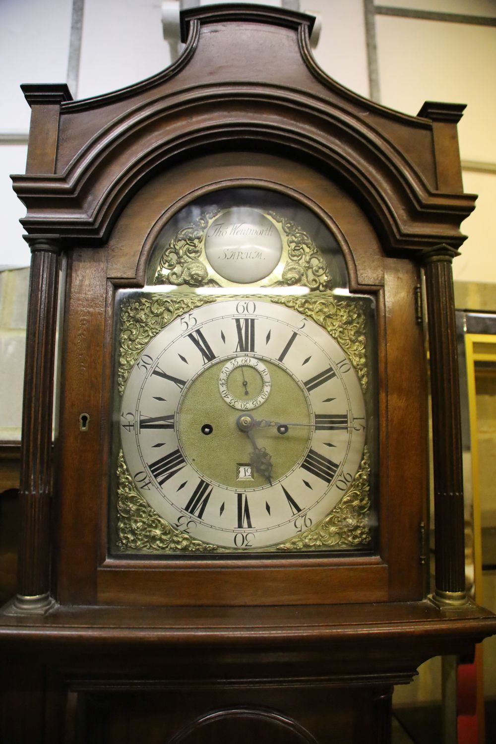 A George III longcase clock, the movement circa 1769, the London style mahogany case circa 1800, height 230cm